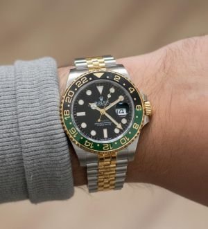ROLEX  2 TONE GREEN BAZEL WORKING QUARTZ
